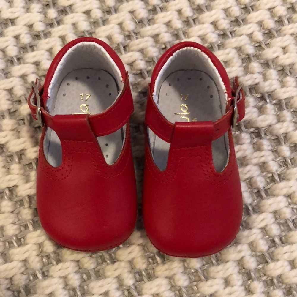 Red buckle t strap crib shoes